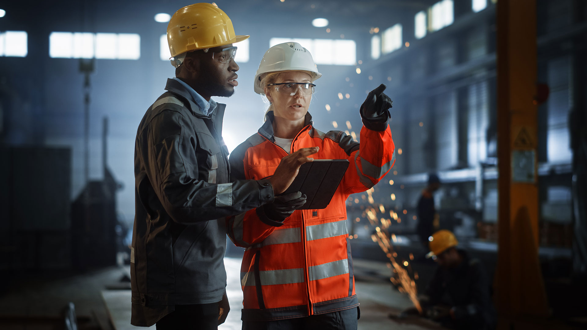 Engineer in orange hi-vis jacket